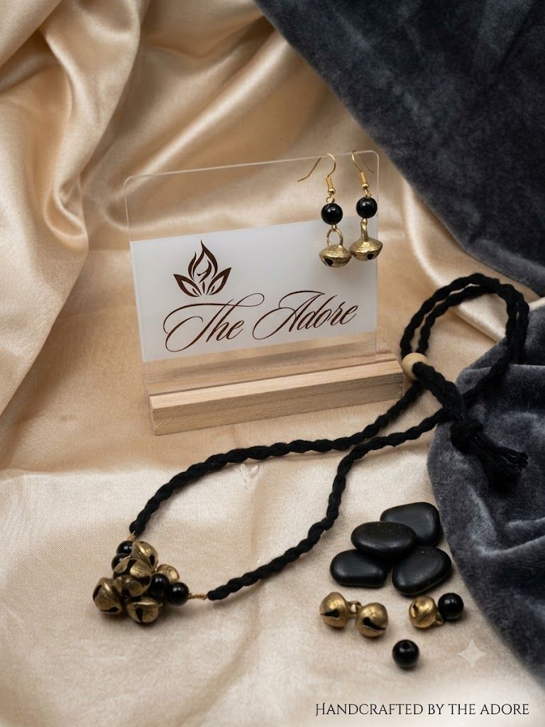 Ghunagaroo black threaded long chain paired with earring
