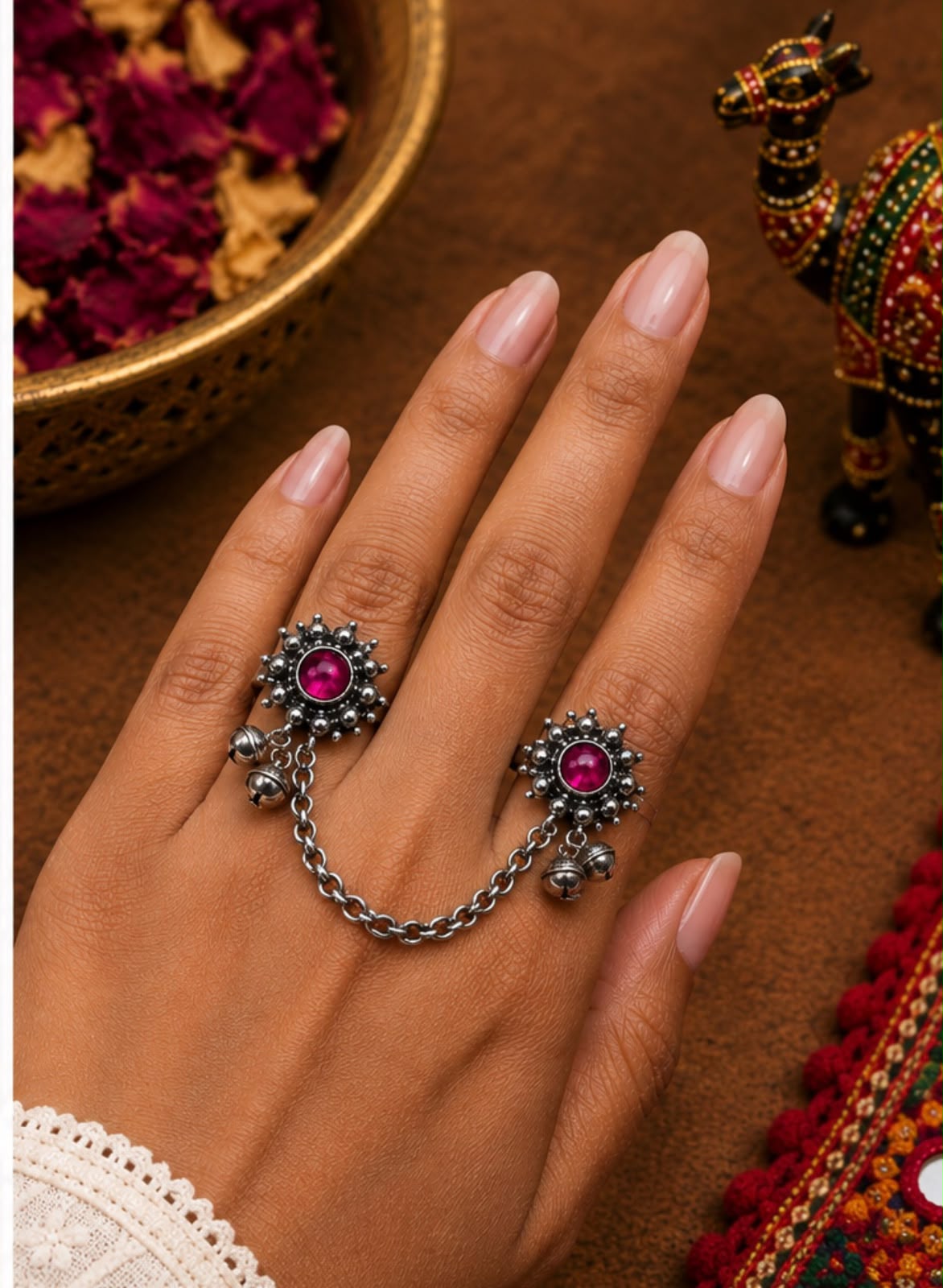 ring to ring Mjenta small bead in sunflower design