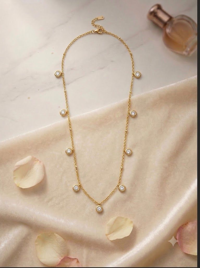 Station bead with white charms in chained necklace